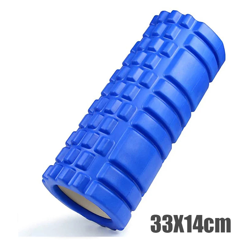 Blue foam roller with textured surface on a white background