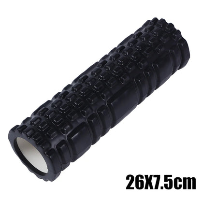 Black foam roller with textured surface on a white background
