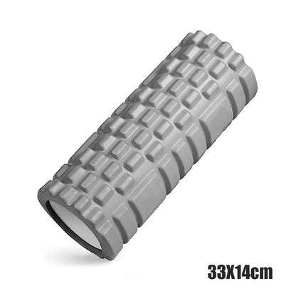 Gray foam roller with textured surface on a white background